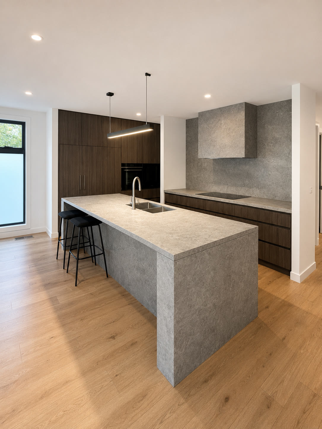 Grey stone island with dark timber cabinetry, Essendon